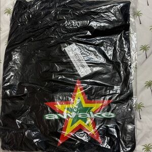 Awake Black Tee with Vibrant Star Design